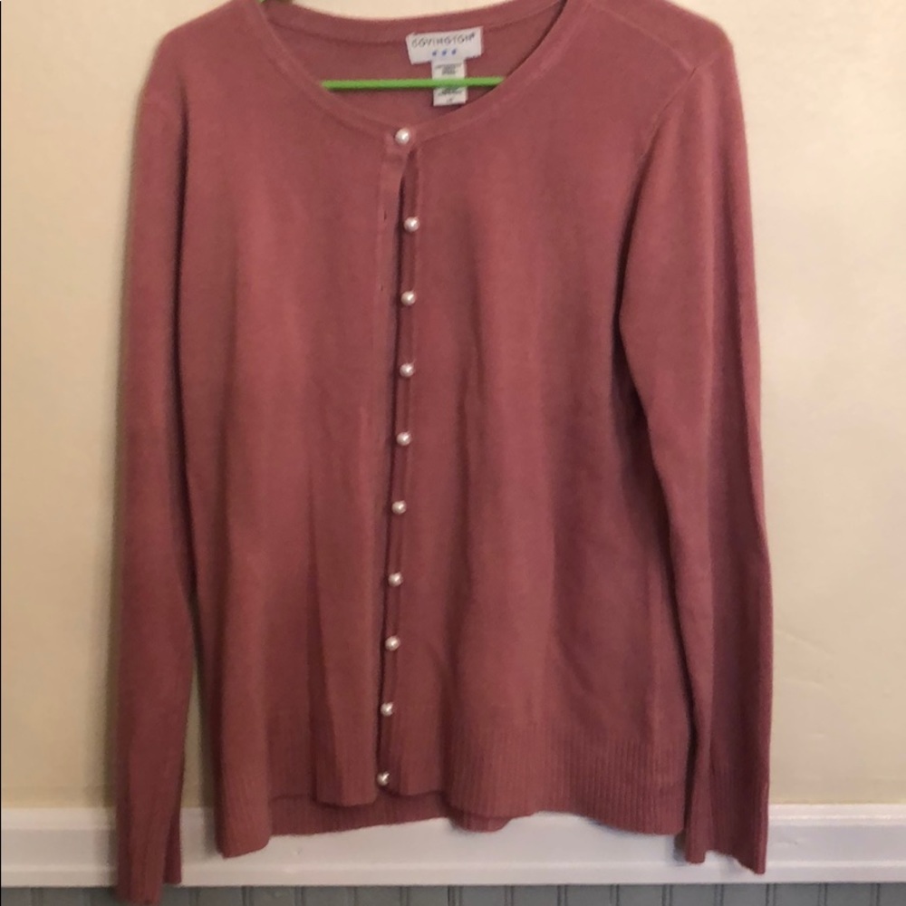 Pink sweater with pearl buttons